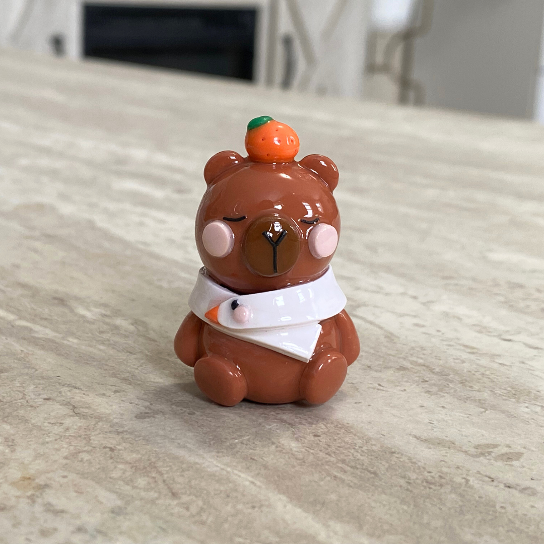 Tangerine Capybara with Goose Scarf Desk Friend